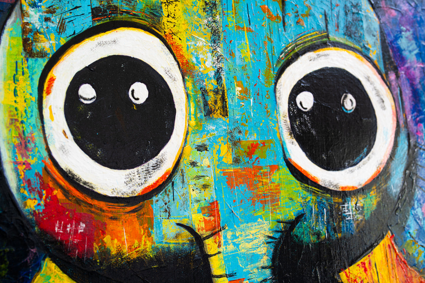Abstract painting of a character with large eyes on a colorful background