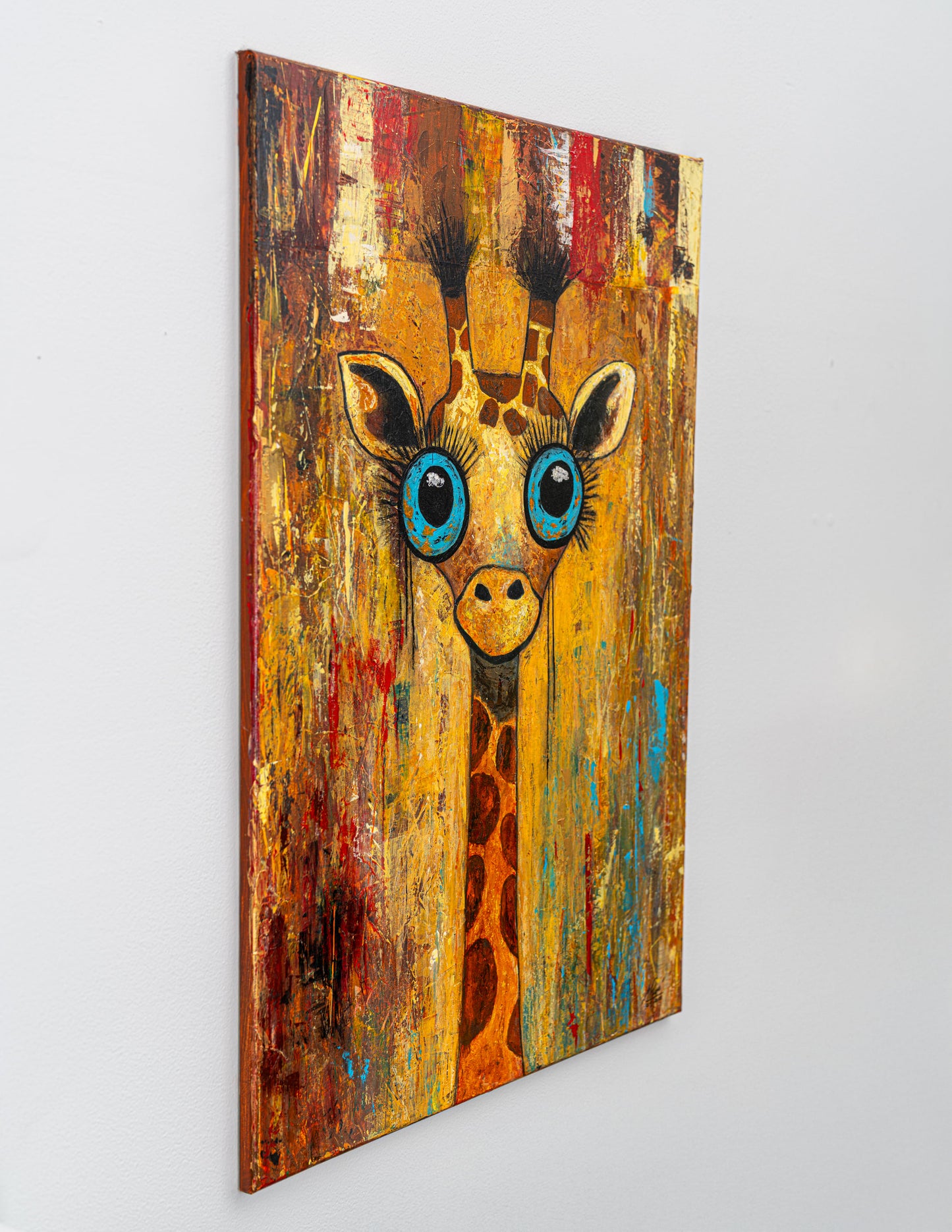 Painting of a giraffe with blue eyes on a wooden panel with a textured background.