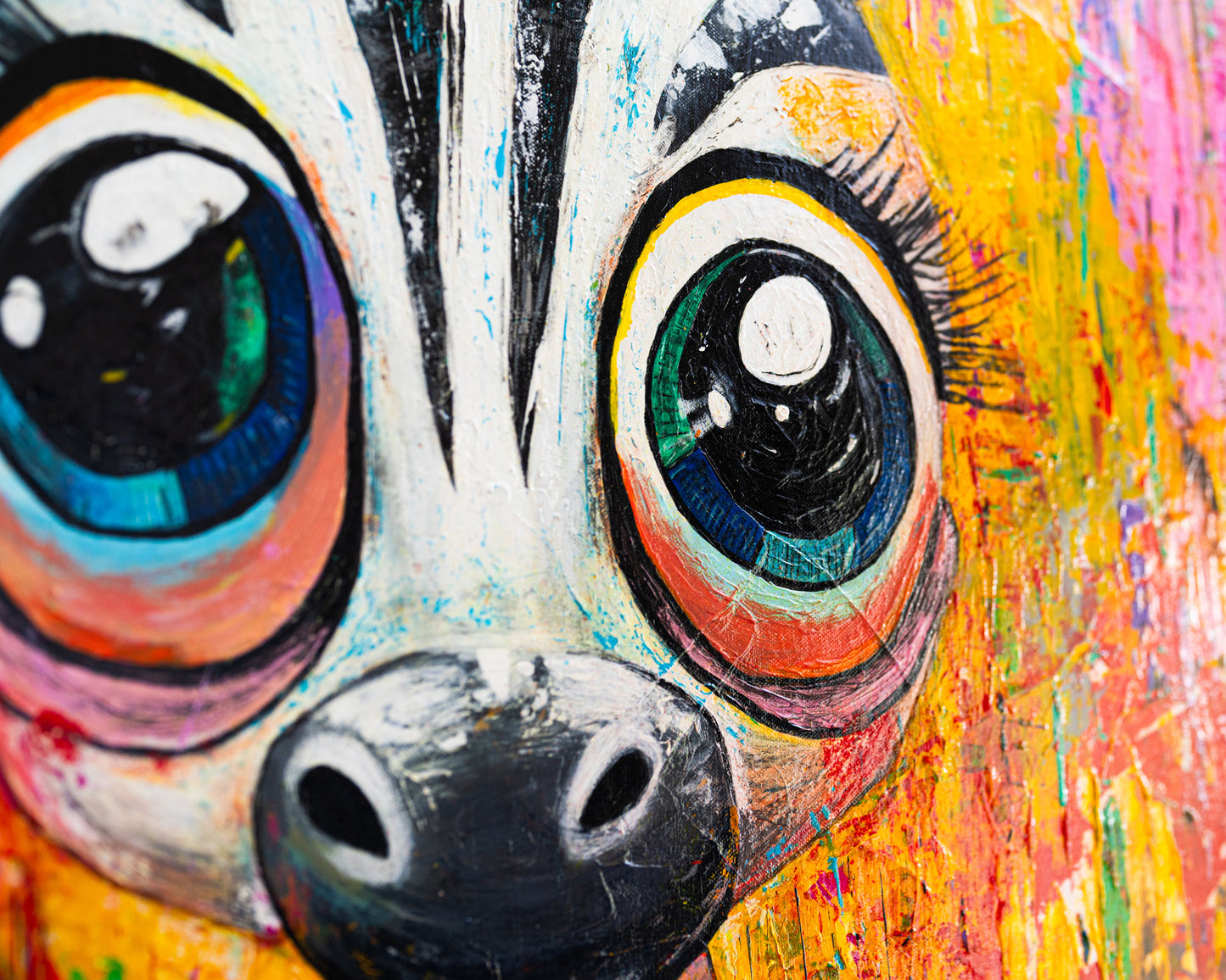 Colorful abstract painting of a dog's face with large eyes and a black nose.