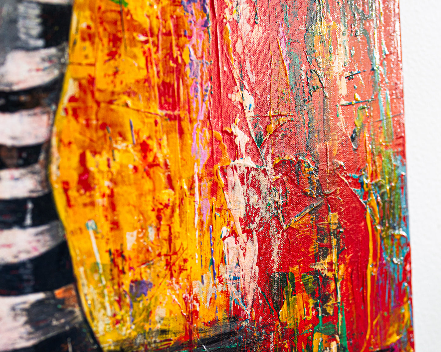 Abstract painting with vibrant colors on a textured surface