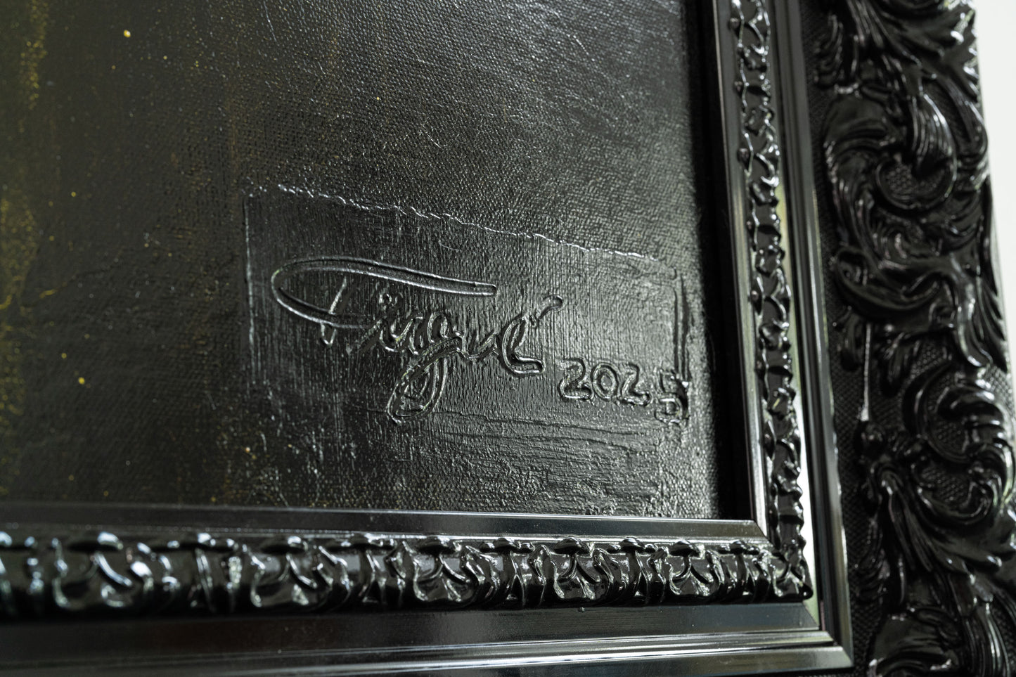 Decorative frame with a signature and date on a textured surface